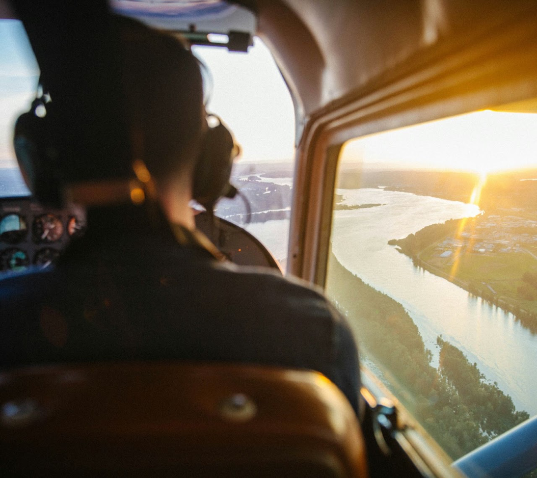View from the cockpit of a general aviation aircraft at sunset