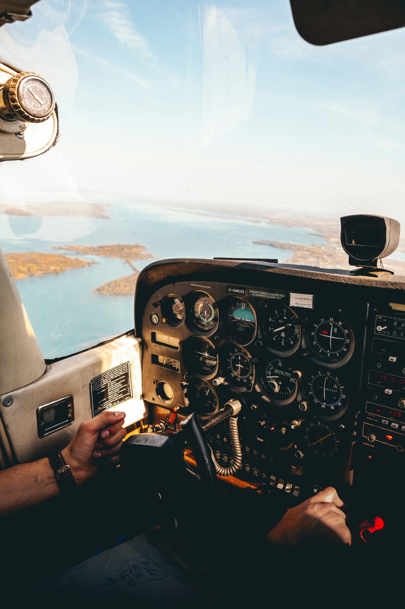 General aviation cockpit in flight over water
